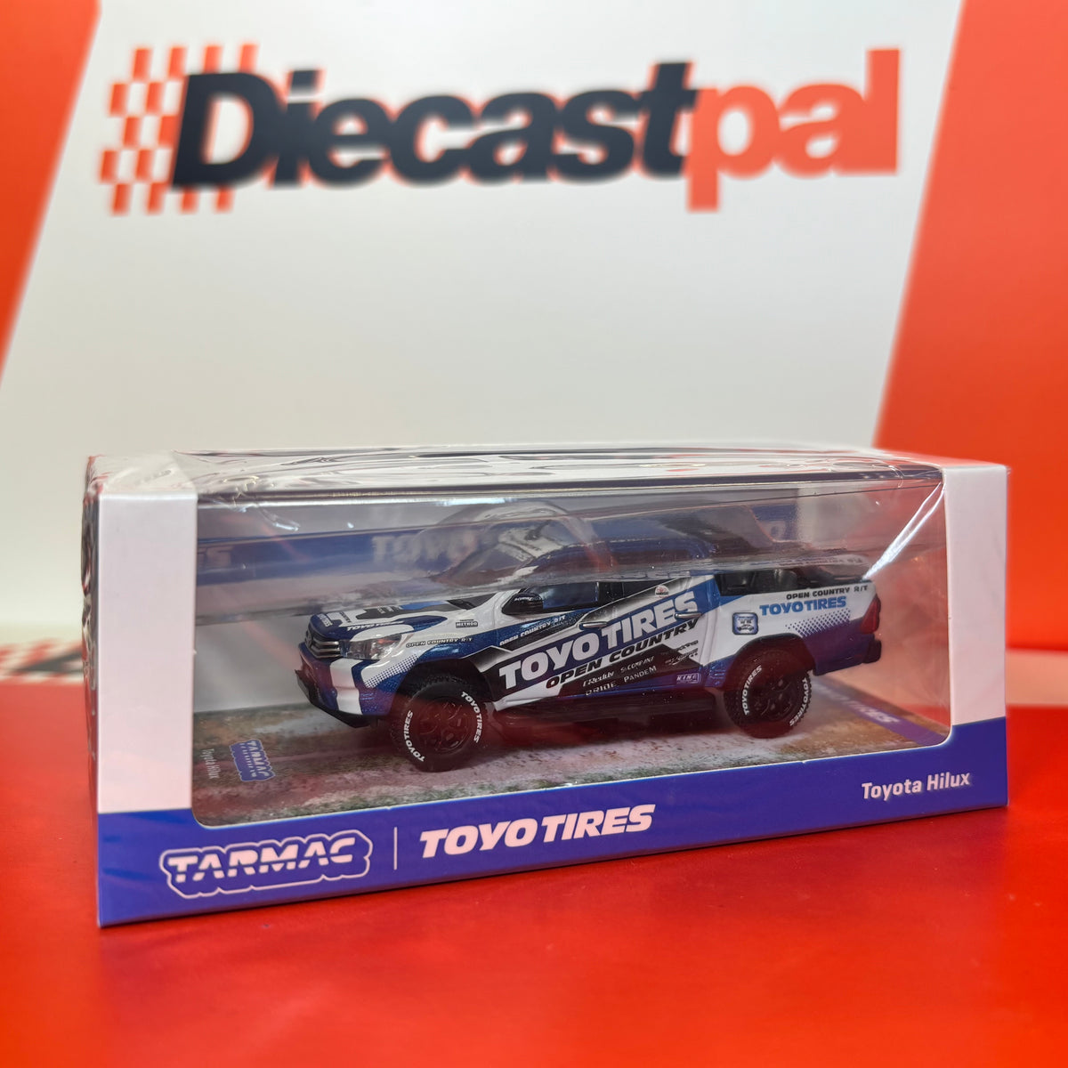Tarmac Works Toyota Hilux Toyo Tires Livery 1/64