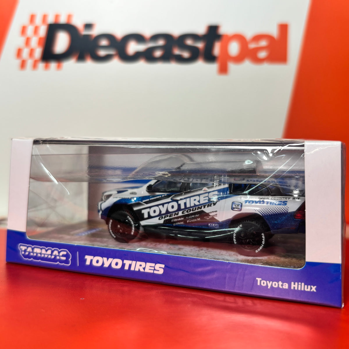 Tarmac Works Toyota Hilux Toyo Tires Livery 1/64