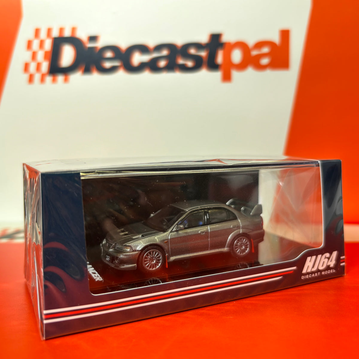 Hobby Japan Mitsubishi Lancer Evolution VI (CP9A) with Mud Flap Satellite Silver 1/64