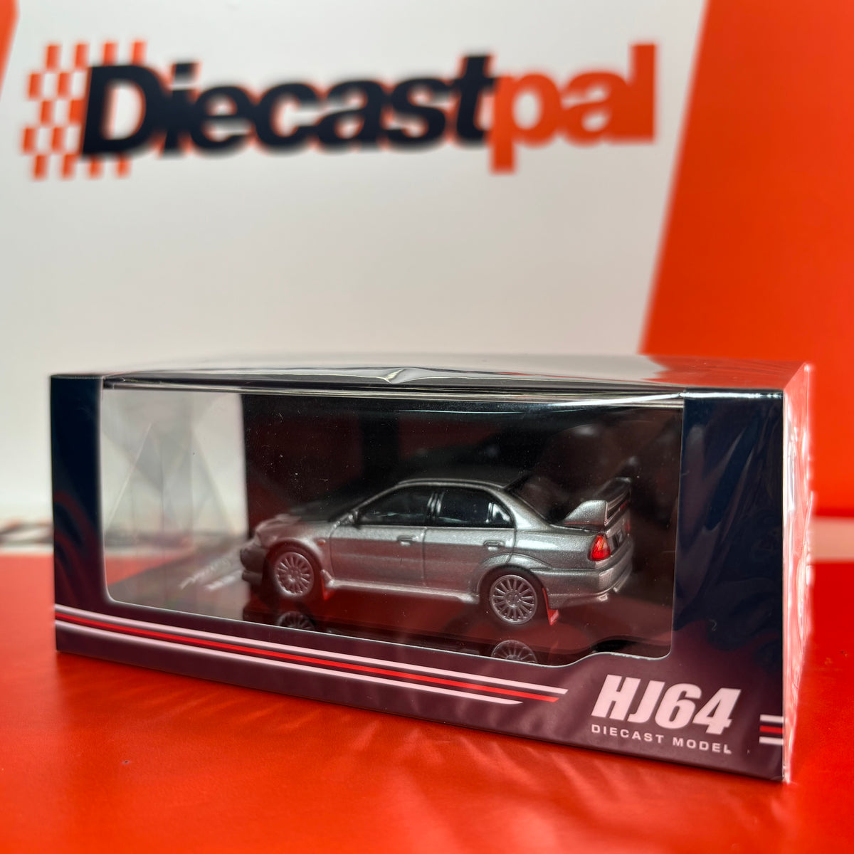Hobby Japan Mitsubishi Lancer Evolution VI (CP9A) with Mud Flap Satellite Silver 1/64