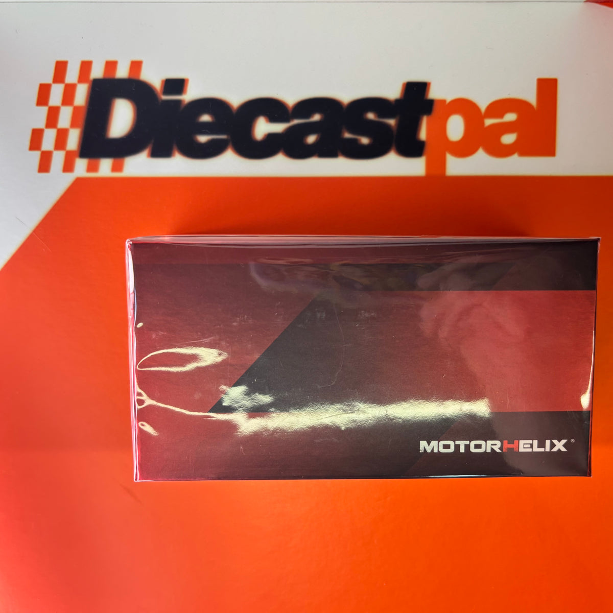 Motor Helix Nissan Skyline GT-R (R34) NISMO Customized Sonic Silver Metallic 1/64